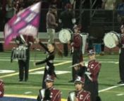 The Chelmsford High School Marching Band performs their field show during halftime in Acton on September 12, 2019.