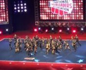 This is Top Gun All Stars&#39; Large Senior Coed Level 5 team, TGLC, competing at the NCA National Championship cheerleading competition at the Kay Bailey Hutchison Convention Center in Dallas, TX on 2/28/15. They were in 1st place out of 8 teams with a score of 98.35 after Day 1.They are from Miami, FL.