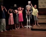 The 2015 Curiosity Club Showing on the last day of our three week summer camp. Bones Song lyrics by director Anita Evans.Encore Brain Song lyrics by Ada.