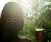 Get 100&#39;s of FREE Video Templates, Music, Footage and More at Motion Array: http://bit.ly/2SITwWM nnnGet this here: https://motionarray.com/stock-video/drinking-hot-tea-outdoors-192510nnDrinking Hot Tea Outdoors is a stock video that exhibits fine footage of a dark silhouette of a woman drinking hot tea outdoors at sunset. You can use this 1920x1080 (HD) video in any project that depicts nature, food, leisure and other related concepts. Include this footage in your next Youtube video, social med