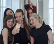 Get 100&#39;s of FREE Video Templates, Music, Footage and More at Motion Array: http://bit.ly/2SITwWM nnnGet this here: https://motionarray.com/stock-video/group-of-young-women-taking-a-selfie-174256nnThe Group Of Young Women Taking A Selfie stock video is a stunning bit of footage that displays a group of women taking a selfie during a pole fitness class. You can use this 3840x2160 (4K) footage in any project that has to do with friendship or pole fitness. Add this footage in your next film, edit,