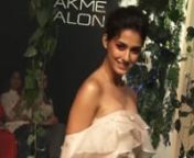 Disha Patani looks dreamy in a dress layered with lively ruffles at Lakme Fashion Week 2018. The actress walked for designer Shriya Som. Disha looked elegant in a Bardot white ruffled, flowy gown. She looked absolutely ravishing as she strutted down the ramp. The gown that she wore was an off-shoulder that highlighted her neckline and also had a long trail. Disha gave all the accessories some rest and let her playful vibrant number do all the talking. Fashion designer Shriya showcased a collecti