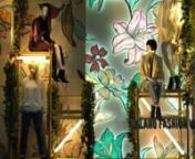 I’m pleased to present the video of the Milano Fashion Week window concept for OVS.nnBig, colorful flowers bloom in the background, contrasting with urban, modern elements, like a city in springtime. Golden industrial scaffolds are brightened up by neon lights and overgrown with greenery, while the backdrop showcases a fresh and delicate floral pattern that highlights some of the collection&#39;s seasonal colors. The light play of the flowbox illuminates the exclusive artwork and blows life into t