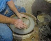A demonstration of throwing a pitcher of a potters wheel. To see more of our work, visit http://www.dodgestationpottery.com.