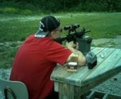 Me shooting the AR at a bell at 500yrds.....Cant seem to get scope to do anything right. switching between iron sights and scope and still not being able to adjust