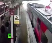 A burst of snow hits a train arriving at a platform in Moscow. A large amount of snow went off the roof of the station following record-breaking ‘snowfall of the century’.