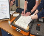 The RNLI team in Farnham, Haslemere &amp; Godalming celebrated the 200 year anniversary of the organisation with a scroll signing ceremony.&#60;br/&#62;Sealed inside a custom orange buoyant briefcase encapsulated the scroll that will be sent to over 250 branches of the RNLI.&#60;br/&#62;Inside the briefcase is a scroll made from bamboo paper and the spindle ends are from a 19th century flag pole from the Isle of Man.&#60;br/&#62;The scroll will have it’s permanent home in the RNLI college in Poole.&#60;br/&#62;The RNLI Scroll began its journey on Monday 4 March 2024 at Westminster Abbey to mark the charity’s official 200th anniversary. It was signed by the RNLI President, HRH Duke of Kent, the Archbishop of Canterbury, the Dean of Westminster and leading RNLI representatives.&#60;br/&#62;On this scroll is the RNLI’s One Crew pledge, in which the RNLI’s promise the&#60;br/&#62;commitment to saving every one we can, without judgment – staying true to Sir William&#60;br/&#62;Hillary’s vision when he founded the charity in 1824.&#60;br/&#62;The Farnham, Haslemere &amp; Godalming branches of the RNLI are all continuing to raise money for the organisation through various means such as abseiling Guildford cathedral.&#60;br/&#62;The Chairman of the Farnham &amp; District Branch is Nigel Cuthbert who will be invited to&#60;br/&#62;sign the Pledge. As part of the 200 year celebrations the Branch is organising a quiz&#60;br/&#62;night on the 20th April and an afternoon Bridge session in August.&#60;br/&#62;Local branches are holding events during the year to celebrate the anniversary with Godalming holding a sponsored abseil down Guildford Cathedral on June 15th, Haslemere&#60;br/&#62;holding an open garden on the 9th June. The local branches at Alton and Petersfield are also having celebratory events.