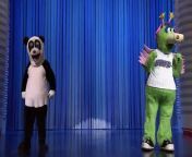 The Orlando Magic mascot, Stuff the Magic Dragon, faces off against the Tonight Show mascot