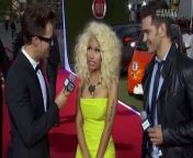 Brad Goreski and Andy Grammer interview Nicki Minaj on the Red Carpet of the 2012 American Music Awards. They discuss her AMA nominations and performances.