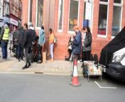 A film crew takes over a section of Library Street, Wigan, to film what is thought to be an advert, as they turn well-known Wigan shoe shop, McNulty&#39;s Shoes, into a florist while shooting the scenes.