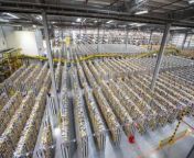Incredible pictures show one of Britain&#39;s largest Amazon depots preparing for Black Friday - in a warehouse the size of 17 football pitches.&#60;br/&#62;&#60;br/&#62;The depot, in Dunfermline, Fife, stretches more than 1.5million square feet and has a whopping has three miles of conveyors.&#60;br/&#62;&#60;br/&#62;Items waiting to be packaged by workers could be seen stacked floor to ceiling.&#60;br/&#62;&#60;br/&#62;Hundreds of seasonal staff will join the permanent workforce which is around 1,200 people strong.&#60;br/&#62;&#60;br/&#62;The site - dubbed EDI4 internally after Edinburgh Airport - has 5,900 solar panels, generating the equivalent amount of electricity needed to power 320 homes per year.&#60;br/&#62;&#60;br/&#62;Black Friday deals started on November 18 and end on November 28.