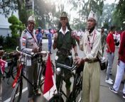 Indonesians take part in a parade where a 100-meter-long flag was showcased in Bogor, in the West Java province, ahead of the upcoming Independence Day, which falls on Aug 17.