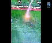 A footballer has died after being struck by a lightning bolt while playing football in Indonesia on Saturday.&#60;br/&#62;&#60;br/&#62;Video captured the exact moment the 35-year-old male victim from Subang collapsed at Siliwangi Stadium in Bandung, West Java.&#60;br/&#62;&#60;br/&#62;The man, later identified as Captain Raharja, was competing in a friendly football match between 2 FLO FC Bandung and FBI Subang when lightning struck him at around 4:20 pm local time on Saturday. &#60;br/&#62;&#60;br/&#62;Reports by local media PRFM News say that he was still breathing after the incident and rushed to a local hospital, but died after suffering intense burns. &#60;br/&#62;&#60;br/&#62;The video clip has since gone viral on social media, with football fans and players offering their condolences.&#60;br/&#62;&#60;br/&#62;&#39;RIP to that player,&#39; commented one X user.&#60;br/&#62;&#60;br/&#62;&#39;This is the stuff of my nightmares. I lived through the San Francisco &#39;Quake of &#39;89&#39; that ended game 3 of the Baseball World Series,&#39; wrote another.&#60;br/&#62;&#60;br/&#62;A third replied: &#39;That&#39;s awful and condolences. In my referee days, I always kept an eye on the weather, it&#39;s in the FIFA manual I believe. For exactly this reason. Don&#39;t know if that was possible here or if there was a ref. This video will make its way to FIFA and ref associations everywhere.&#39;&#60;br/&#62;&#60;br/&#62;Several teams in Indonesia were seen taking a moment of silence in Septain&#39;s memory. &#60;br/&#62;&#60;br/&#62;A match between FBI Mageland and Erka began with players bowing their heads to commemorate the fallen sportsman. &#60;br/&#62;&#60;br/&#62;An analysis of the strike by Indonesia&#39;s Meteorology, Climatology, and Geophysics Agency (BMKG) revealed that the cloud the lightning came from was just 300m above the stadium when it struck. &#60;br/&#62;&#60;br/&#62;The tragic incident is the second time an Indonesian footballer has been struck by lightning in the last 12 months.&#60;br/&#62;&#60;br/&#62;A young football player in Bojonegoro, East Java was struck by lightning during the Soeratin U-13 Cup in 2023.&#60;br/&#62;&#60;br/&#62;The player, who suffered cardiac arrest, was rushed off the field and taken to the Ibnu Sina Hospital in Bojonegoro for medical treatment.&#60;br/&#62;&#60;br/&#62;The youngster was successfully revived after medical assistance and regained consciousness after approximately 20 minutes.&#60;br/&#62;&#60;br/&#62;In 2023, a 21-year-old Brazilian footballer was also struck by lightning while on the pitch in Brazil. &#60;br/&#62;&#60;br/&#62;Caio Henrique de Lima Goncalves, 21, was playing for his Uniao Jaiirense team in a cup fixture in the southern state of Parana when he was jolted by the lightning strike&#60;br/&#62;&#60;br/&#62;He was rushed to hospital after collapsing on the pitch, but he later died of his injuries.&#60;br/&#62;&#60;br/&#62;Six other players on the pitch were also struck by the bolt of lightning and spent time in the hospital afterward.
