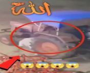 In this video you can see that a man came under the tire of the tractor while switching off the tractor but he was saved due to Allah and nothing happened to him, he got up again and switched off the tractor.