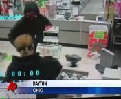 Police say an officer, who went to an Ohio pharmacy to pick up security video of another robbery hours earlier, stopped a second robbery. The incident at a Walgreens in Dayton was caught on surveillance tape. (Dec. 17)