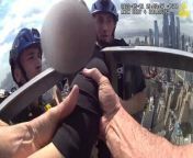 Heart stopping footage shows NYPD pulling woman off the ledge of a skyscraperNYPD News Twitter