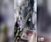 This is the dramatic moment firefighters rescued a man from a burning flat.