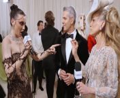 Sarah Jessica Parker talks to Emma Chamberlain at the 2024 Met Gala about her exciting Richard Quinn dress and Philip Treacy hat. Andy Cohen also talks about how much he loves going to dinner and museums with SJP.